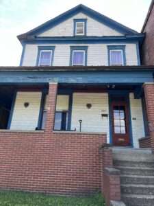 Blue and white two-story house