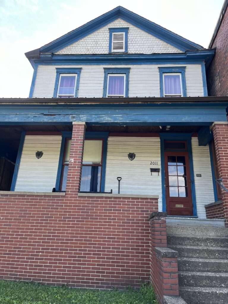 Blue and white two-story house